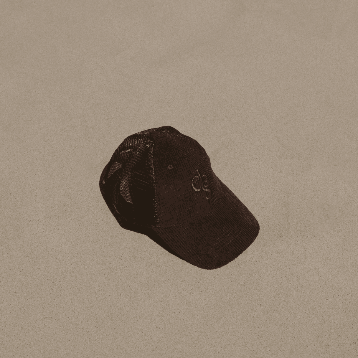 eco by sonya burgundy mesh cap on beach